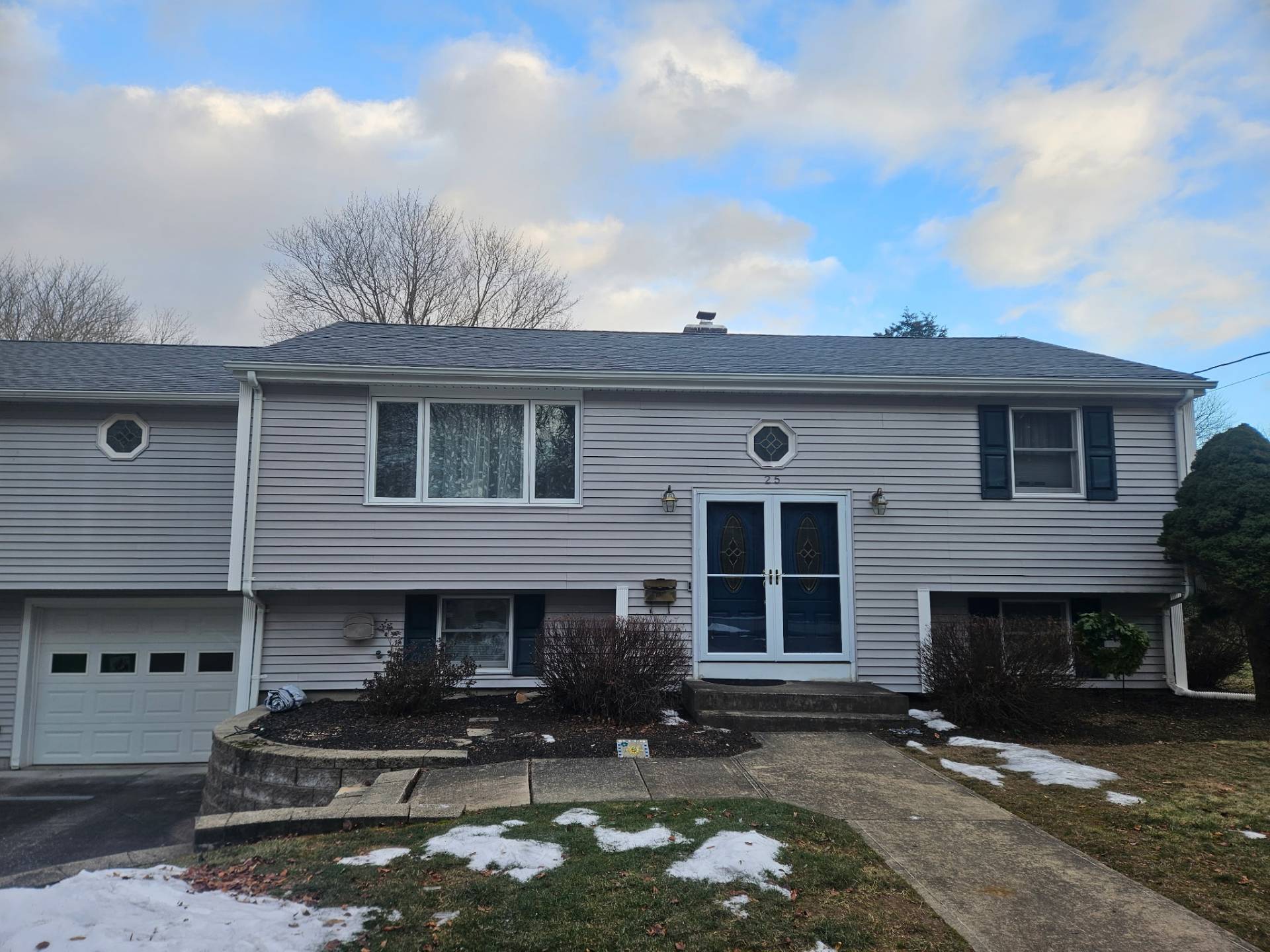 Completed roof on a ranch-style home | Nansemond River Roofing & Siding