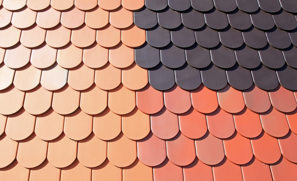Roofing work taking place on a building | Nansemond River Roofing & Siding